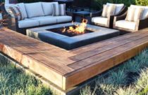 Ambiente com Deck de madeira - Deck com lareira central para relaxar com os amigos