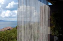 Cortina transparente com vista para o mar