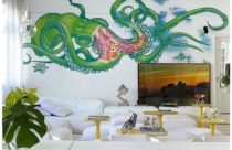 Grafite colorido em parede branca para sala