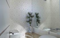 Lavabo pequeno decorado com papel de parede e bancada em mármore